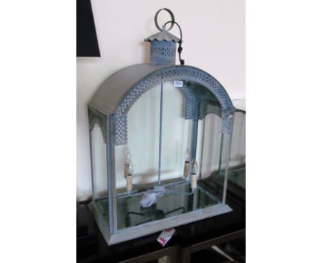 A large modern light in lantern