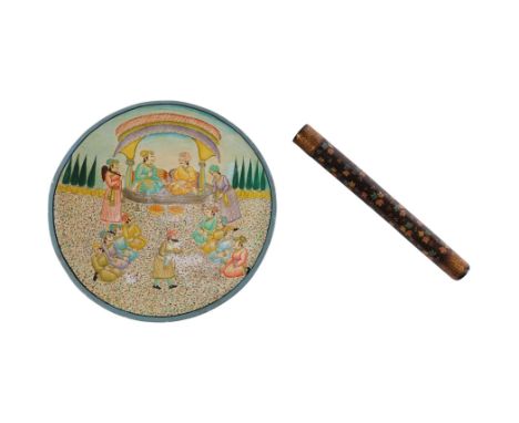 A Kashmir lacquered papier-mâché  circular dish, 32cms diameter; together with a Persian lacquer scroll case, 34cms long (2).