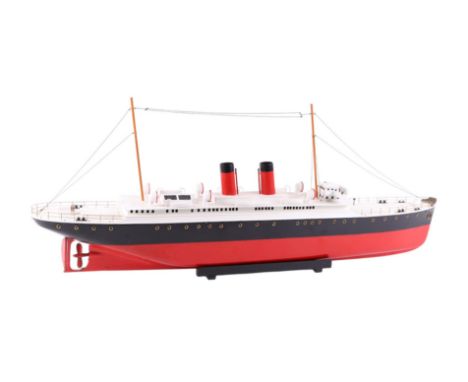 A Bassett-Lowke ocean going liner model, the one-piece carved hull in Castle Line livery, the deck with brass handrails, twin