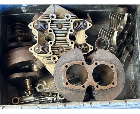 Assorted Triumph motorcycle twin engine components including cylinder heads, crank, conrods and cylinders.