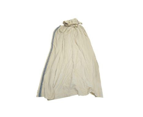 A heavy single or door curtain with fan edged trim by Colefax & Fowler, approx 210cms drop by 186cms full fabric width.
