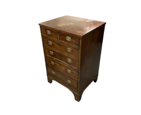 A 19th century mahogany chest of small proportions, with five graduated long drawers, on bracket feet, 45cms wide.
