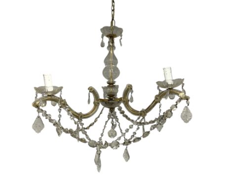A three-branch chandelier with prismatic drops, 38cms high.