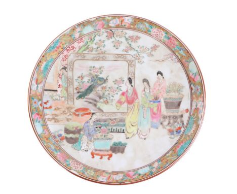 A Chinese famille rose charger decorated with figures, 31cms diameter.