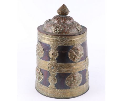 A mixed metal Tibetan Chang flask and cover decorated with Buddhistic lions, approx 37.5cms high.