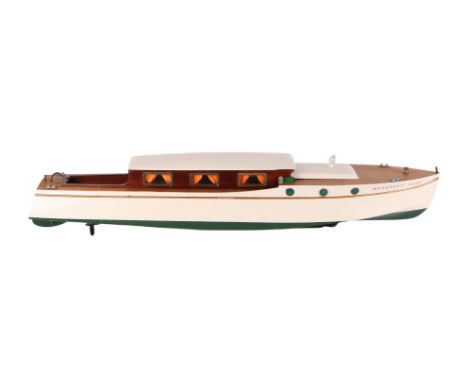 A Bassett-Lowke electric cruising yacht, the electric motor to single  propeller, carved hull with laminated sides and lined 