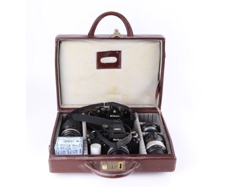 A Nikon EL2 35mm camera fitted with a Nikkor-P Auto f-55mm lens, A Nikon AS 35mm camera fitted with a Nikkor 20mm lens, toget