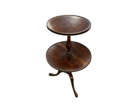 A 19th century mahogany revolving two-tier dumb waiter on turned column and tripod base, 103cms high, max width 62cms.