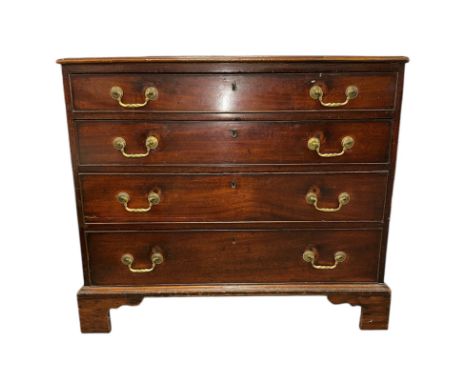 A George III mahogany chest of four graduated long drawers, on bracket feet, 95cms wide.