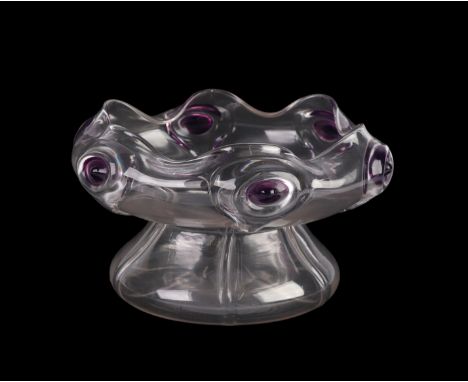 An Art Nouveau glass bowl with amethyst coloured roundels, probably Stuart of Stourbridge, 22cms diameter.