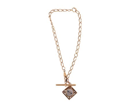 An 18ct gold Albert pocket watch chain with T bar and yellow metal mounted compass fob, 36cms long, 34.6g total weight.