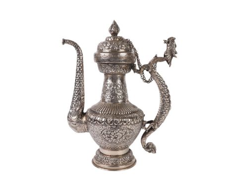 A large Chinese silver coloured metal wine pot with dragon handle, 35cms high.