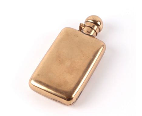 A 9ct gold miniature hip flask, 9cms high, 50g.Condition ReportThere is general wear, the cap screws down correctly and appea