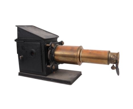 A Victorian Magic Lantern with brass twin-draw lens and black lacquered body, approx 66cms long. Provenance: from the collect