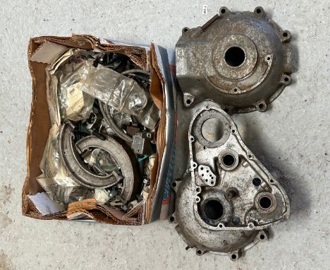 A quantity of assorted Triumph motorcycle spares including crank case covers, brake drums, levers, cables and other items.