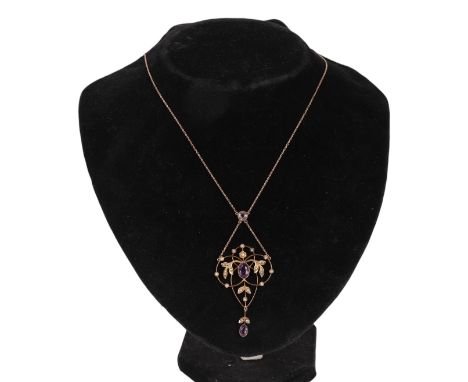 An Edwardian 9ct gold amethyst and seed pearl set pendant on a fine 9ct gold chain, 5.2g.