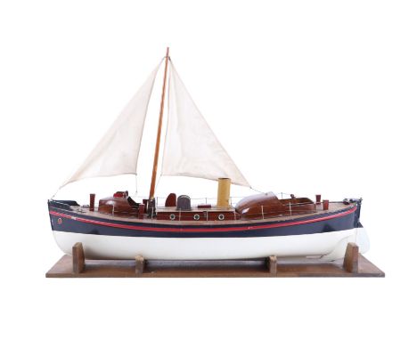 A Basset-Lowke motor lifeboat circa 1938, the carved wooden hull with lined deck, folding mast, wheelhouses fore & aft, remov