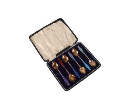 A set of six continental silver gilt and enamel coffee spoons, 60gCondition ReportEach spoon has chips and rubbing to the ena