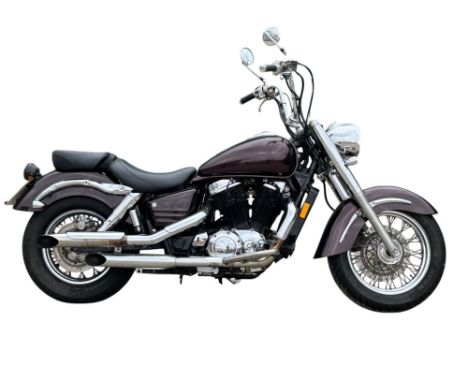 A 2000 Honda Shadow Aero-C3 VT1100, registration no. V149 LAH, Black Cherry metallic Harley Davidson paint.  Our vendor advis