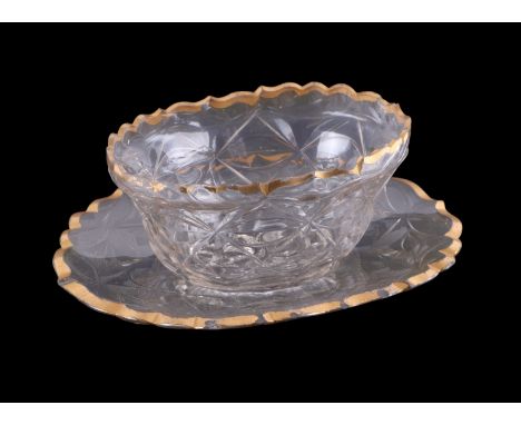 A 19th century cut glass bowl on stand with gilded rim, possibly Irish, max width 27cms.