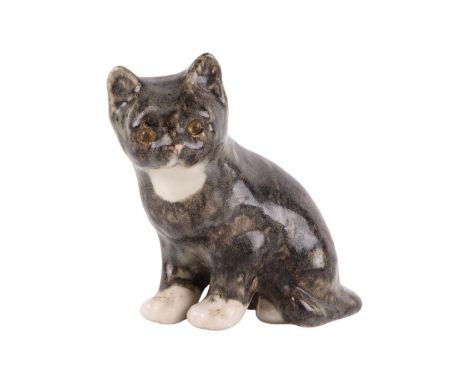 A Winstanley pottery figure of a seated cat, 18cms high.