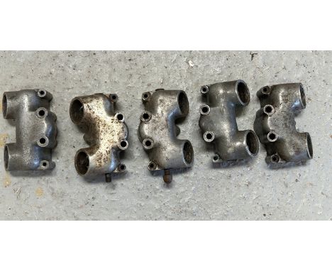 A quantity of assorted Triumph motorcycle aluminium cylinder head valve covers including part nos. E14612-2 and E1458.