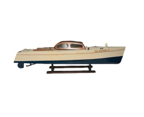 A Bassett-Lowke clockwork day cruiser Iolantha II, circa 1935, with painted wooden hull with maker's transfer label to the st