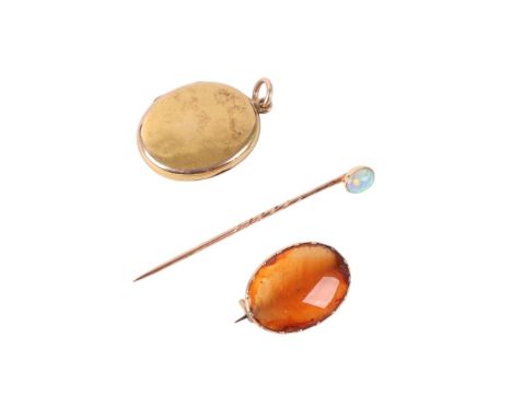A yellow metal opal set stick pin; together with a yellow metal mounted agate brooch and a yellow metal mourning pendant lock