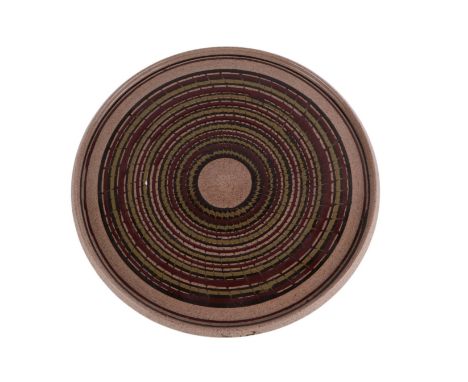 A Guy Sydenham Poole Pottery stoneware Modernist charger with impressed mark to the underside, 35cms diameter.