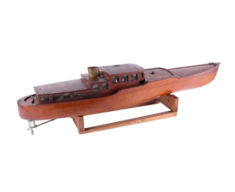 A Bassett-Lowke cabin cruiser, circa 1930s, of mahogany construction, with a removable cabin section revealing twin clockwork