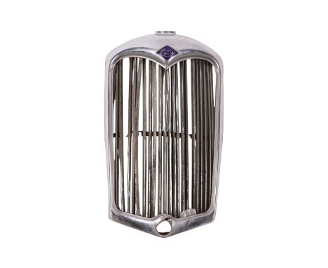 A Riley chrome plated radiator surround and grill with original Riley enamel plaque, 42cms wide by 66cms.