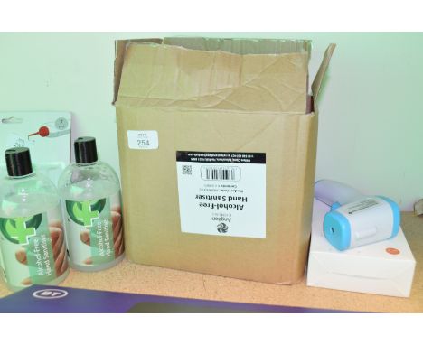 Five bottles of alcohol free hand sanitiser and a non-contact infra-red thermometer