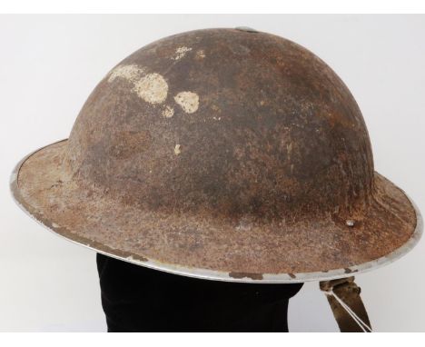 British WWII Brodie helmet with liner, shell in semi-relic condition. P&amp;P Group 2 (£18+VAT for the first lot and £3+VAT f