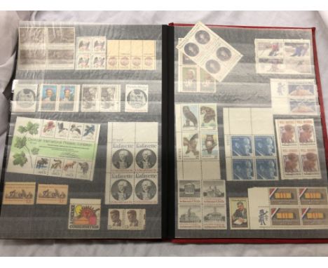 STAMP ALBUM CONTAINING GB AND WORLD POSTAGE STAMPS