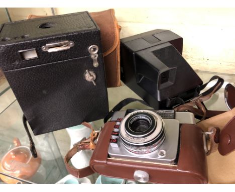 POLAROID 635 CAMERA, ILFORD 35MM AND A BOX CAMERA