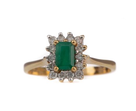 EMERALD AND DIAMOND RING,set with an emerald cut emerald within a halo of round brilliant cut diamonds totalling approximatel