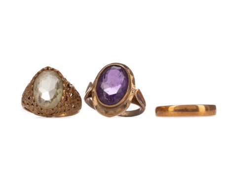 EIGHTEEN CARAT GOLD WEDDING BAND, size R, 1.6g, along with two nine carat gold gem set rings, 9.6g gross (3)