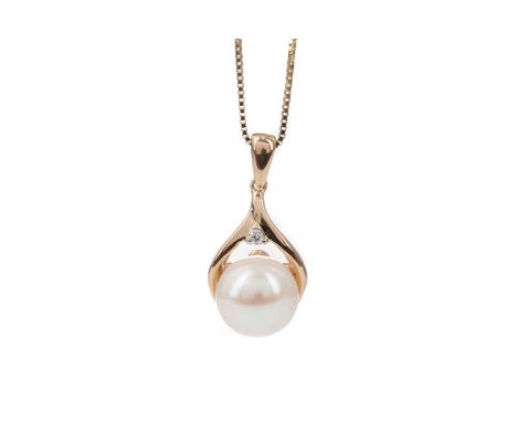 PEARL AND DIAMOND PENDANT,the spherical pearl topped by a diamond chip, on a chain marked 10K, 2.1gCondition report: Lightly 