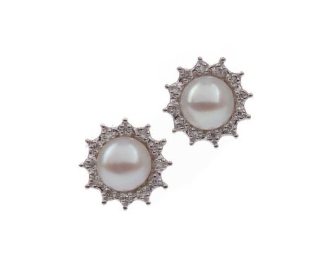 PAIR OF PEARL AND DIAMOND STUD EARRINGS,the spherical pearls within round brilliant cut diamond halos, in nine carat white go