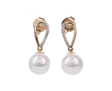 PAIR OF PEARL AND DIAMOND EARRINGS,the spherical pearls suspended from a diamond set post, marked 10K, 2.3g