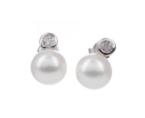 PAIR OF PEARL AND DIAMOND EARRINGS,the spherical pearls beneath a round brilliant cut diamond, the diamonds totalling approxi