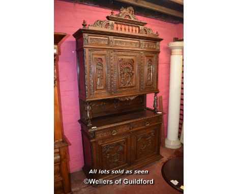 19TH CENTURY CONTINENTAL OAK COURT CUPBOARD, ORNATELY CARVED ALL OVER WITH FIGURES IN LANDSCAPES, THE TOP WITH THREE DRAWERS 