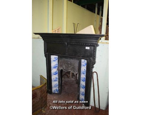 DECORATIVE CAST IRON FIREPLACE WITH DELFT STYLE TILE INSERTS, 132CM X 20CM X 136CM