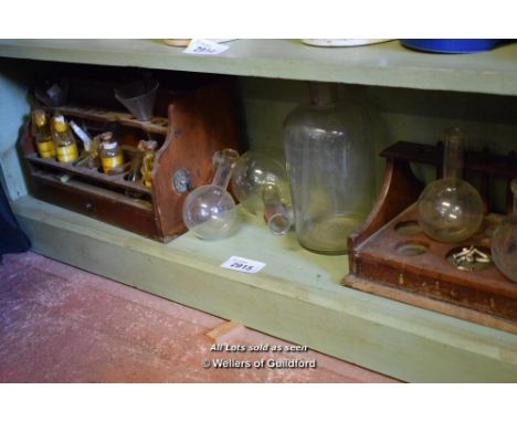 SHELF OF SCIENTIFIC TUBES