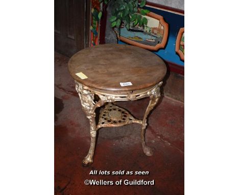 VINTAGE ROUND WOODEN PUB TABLE TOP ON GILT CAST IRON BASE WITH CLAW FEET, 63CM DIAMETER, 75CM HIGH