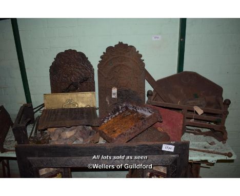 SHELF OF MIXED FIREPLACE ACCESSORIES INCLUDING CAST IRON FIRE BACKS AND BASKETS