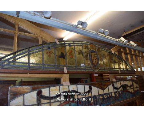 ARCHED LEADED LIGHT PANEL 'TB LTD', 254CM X 45CM