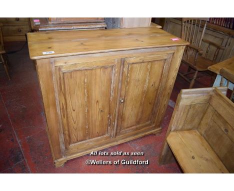 PINE CUPBOARD WITH TWO PANELLED DOORS ENCLOSING A SHELF, 101CM X 115CM X 48CM