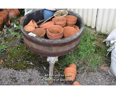 QUARTER BARREL PLANTER ON CAST IRON BASE