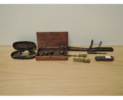 Two Victorian Sovereign Scales another Coin Scale and a part set of brass weights etc